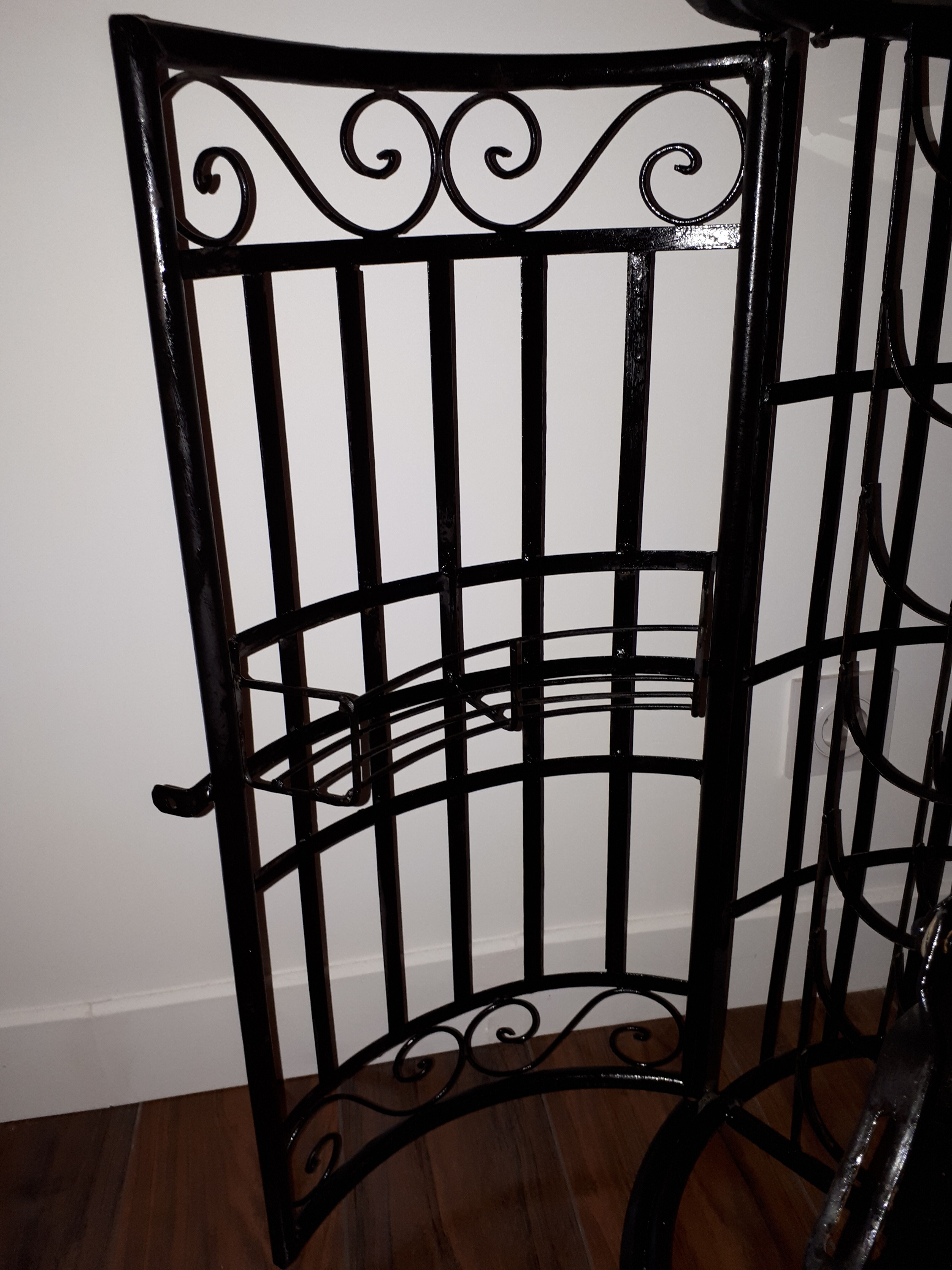 Wrought iron bar with bottles holder