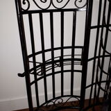 Wrought iron bar with bottles holder