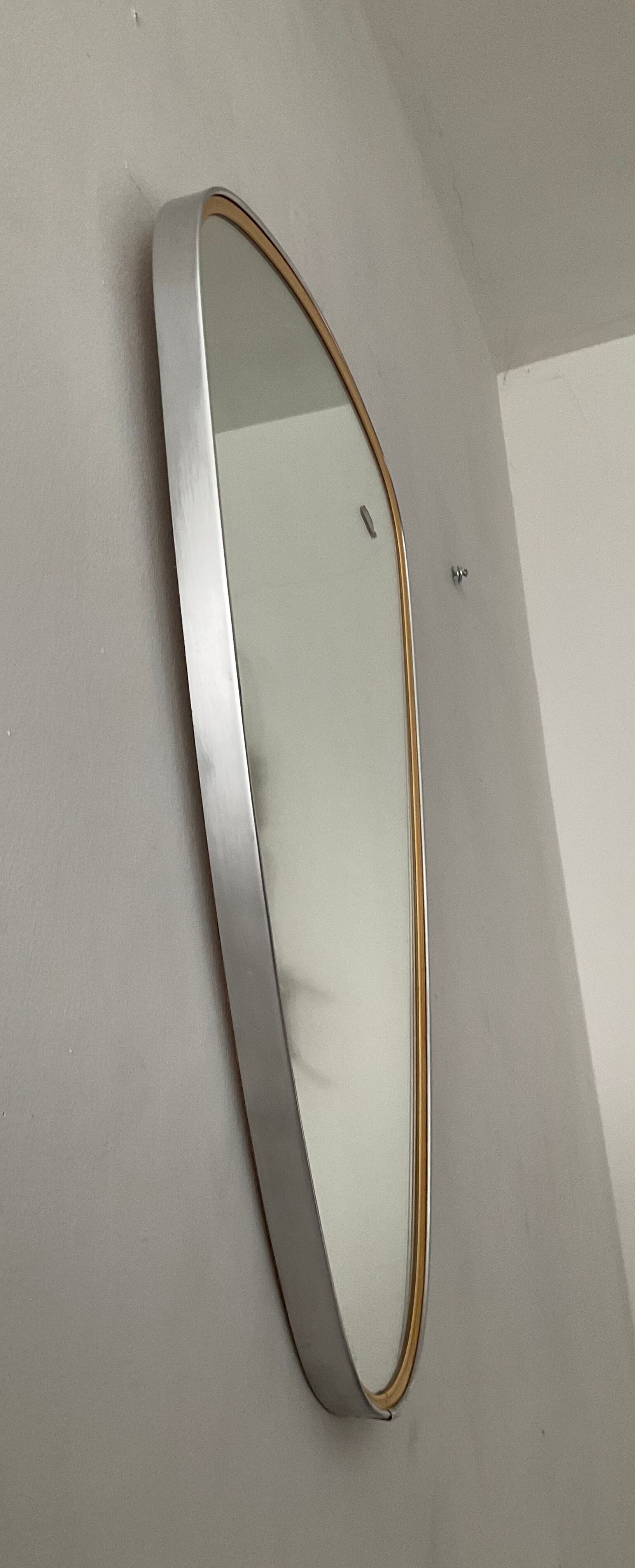 Asymmetrical mirror Deknudt from the 60s
