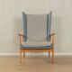 1950s wingback armchair in two-tone look, cherry wood, newly upholstered