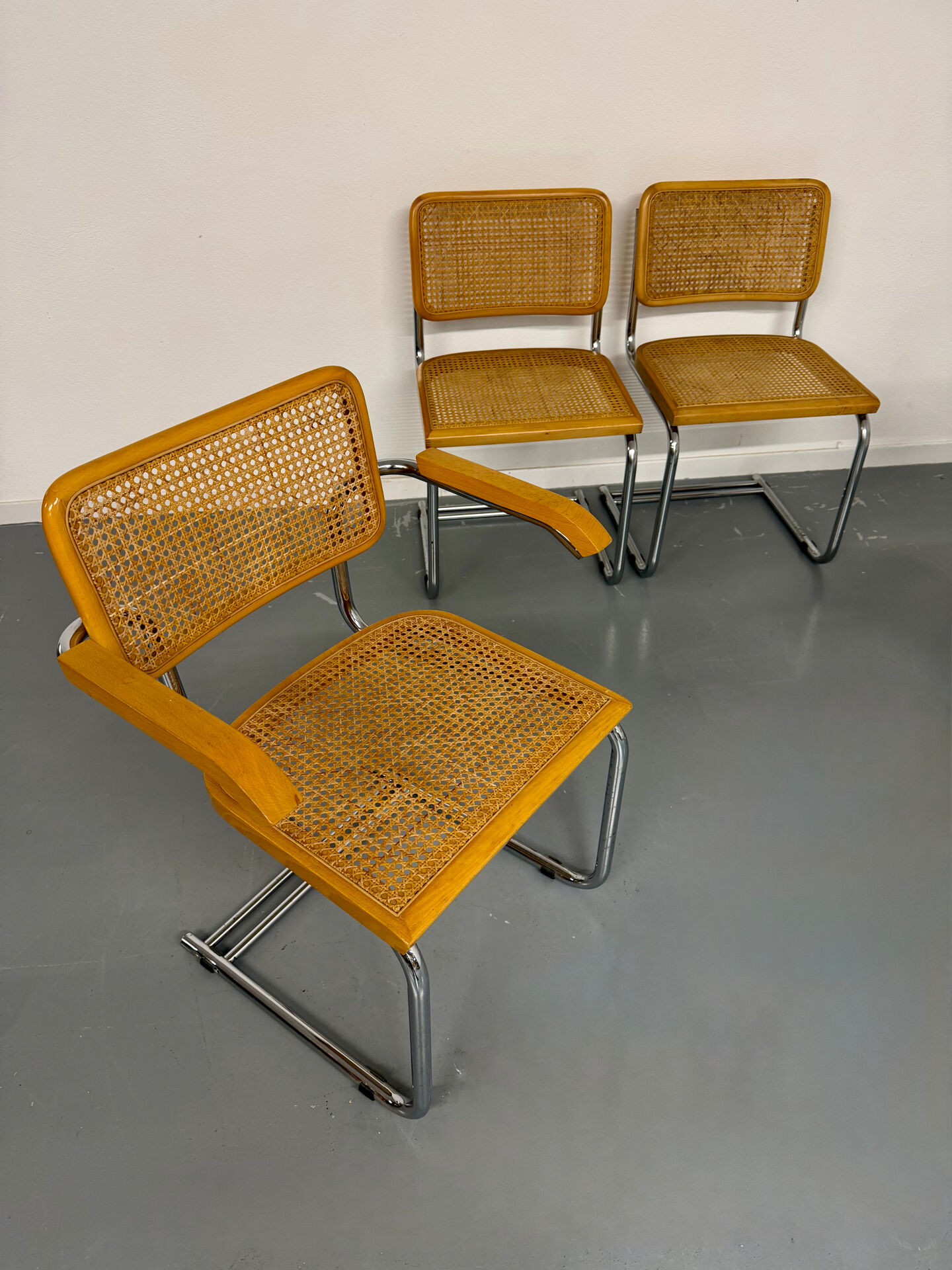 Set of 4 cane cantilever chairs and armchairs, Cesca, 1970s.