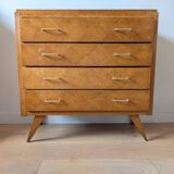 Vintage chest of drawers with checkerboard and compass feet