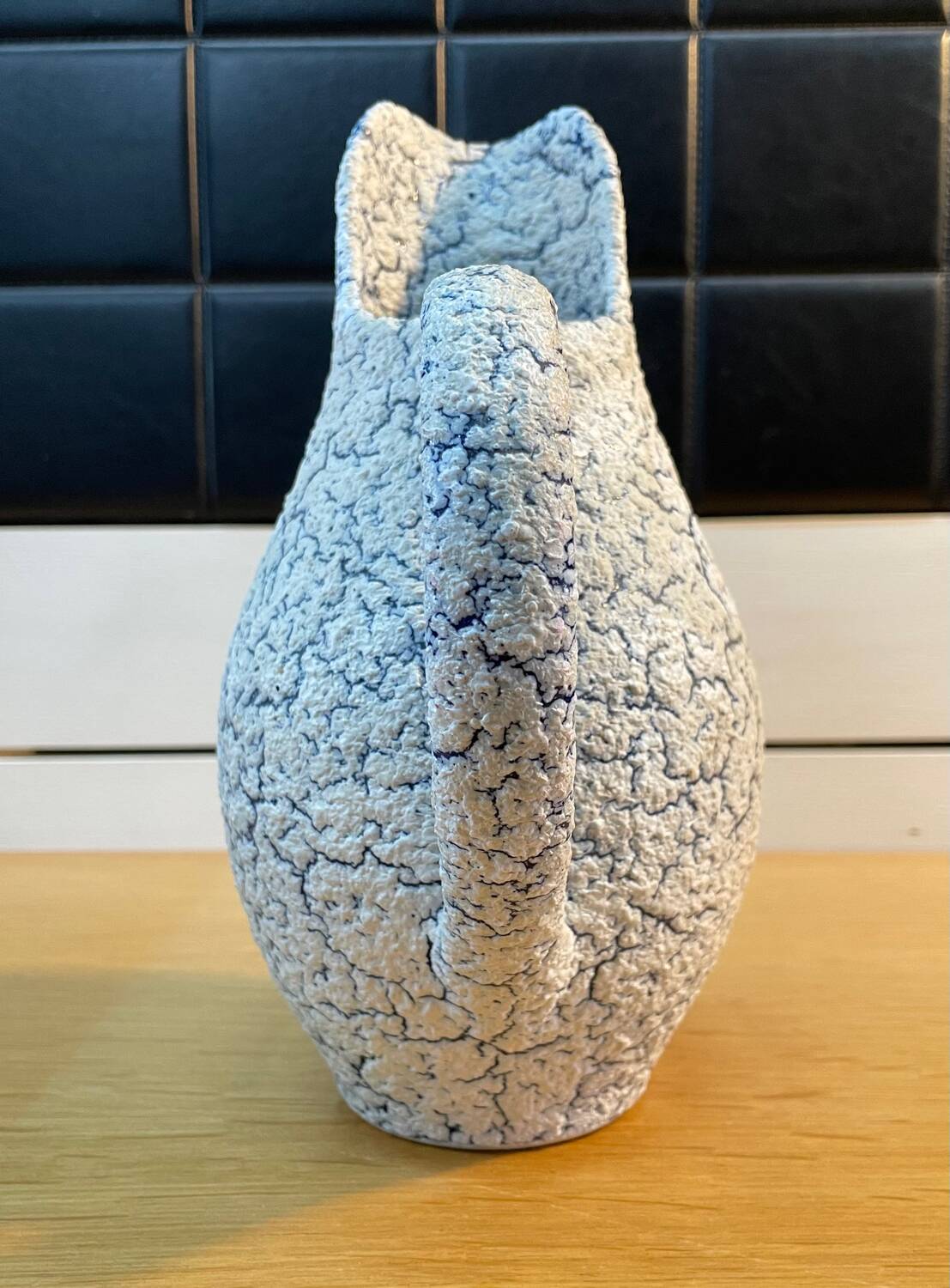 White and blue crisped ceramic pitcher