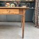 Renovated oak and walnut farmhouse table.