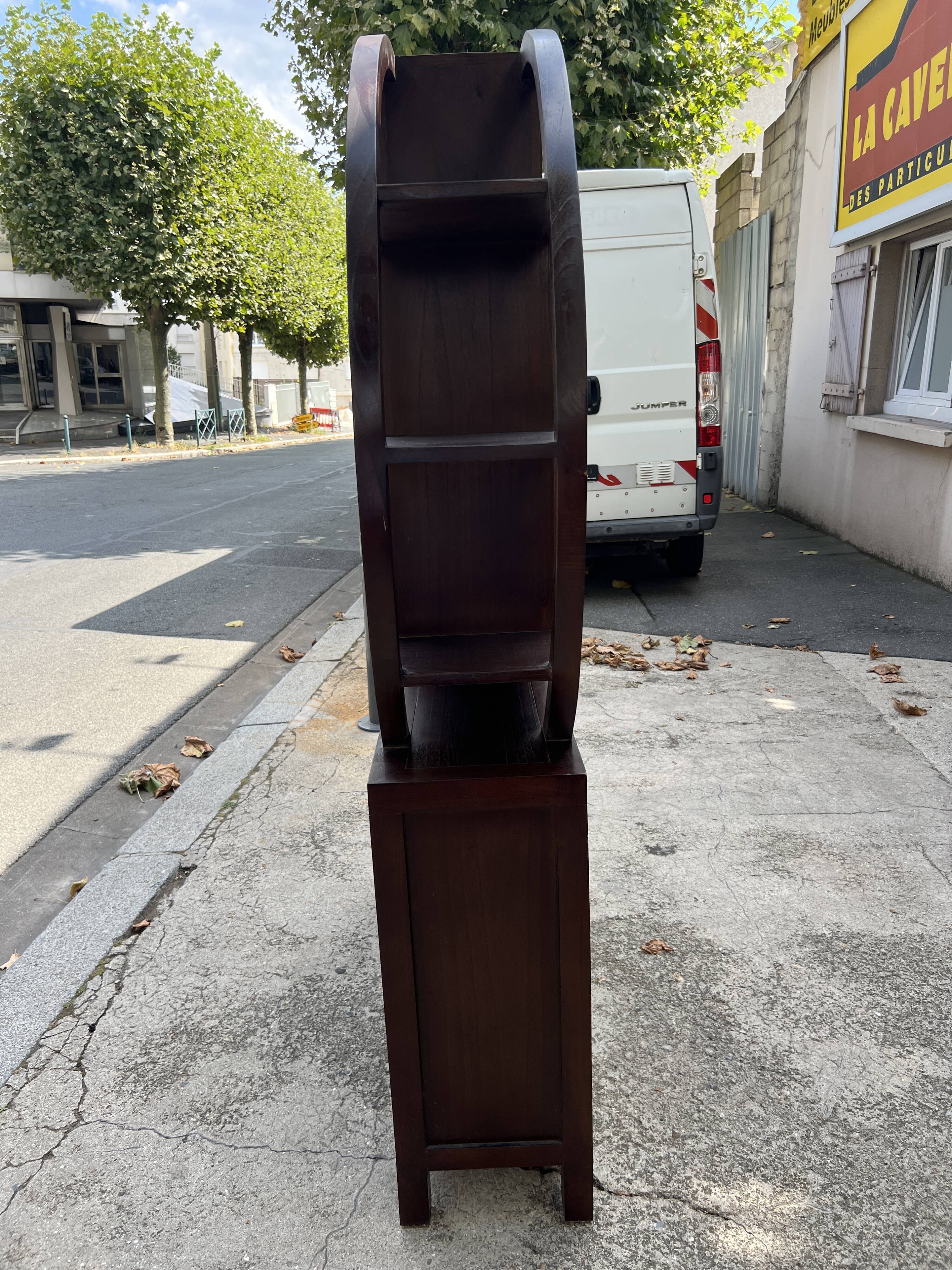 Round galay shelf on bahut sideboard