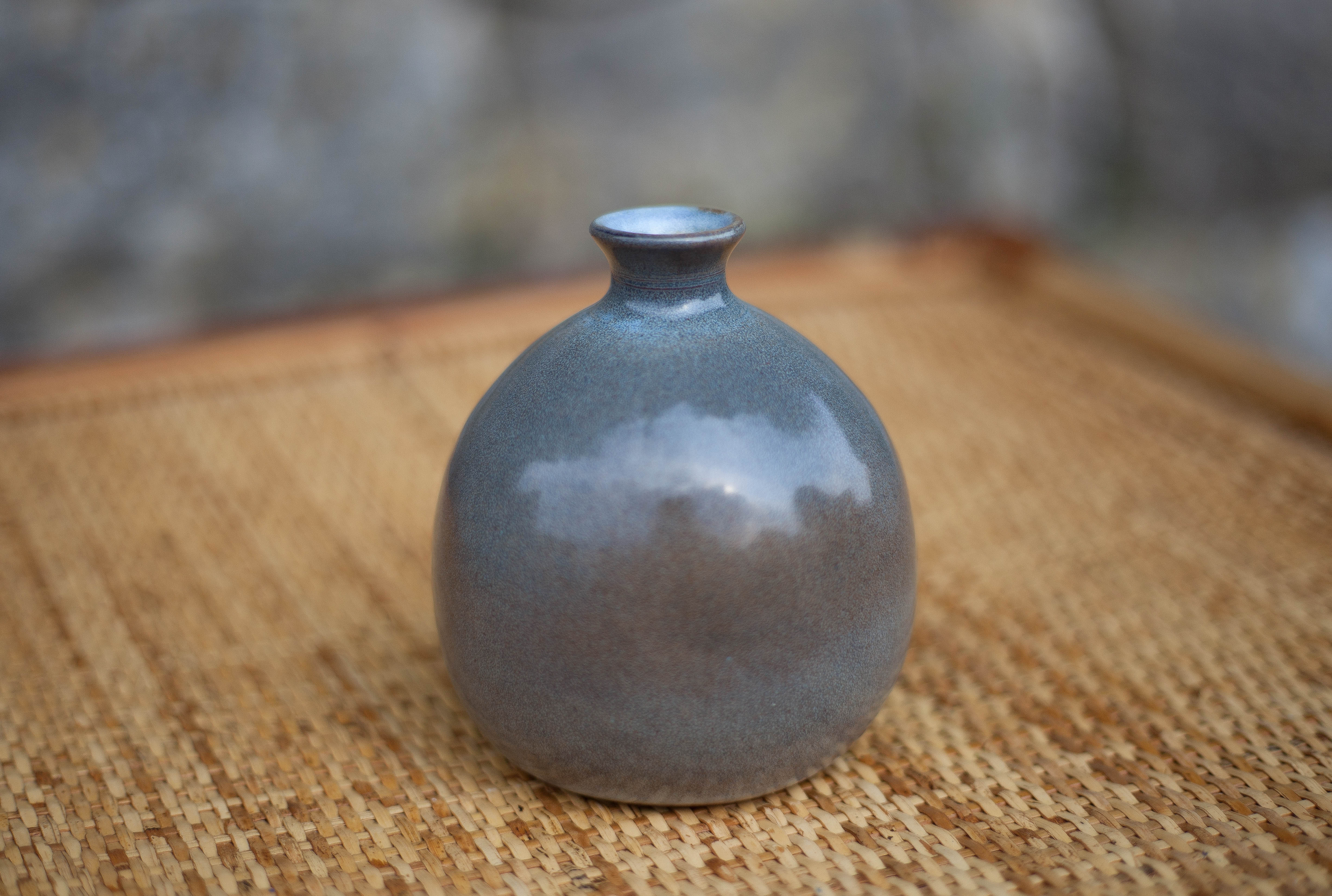 Glazed terracotta ball vase