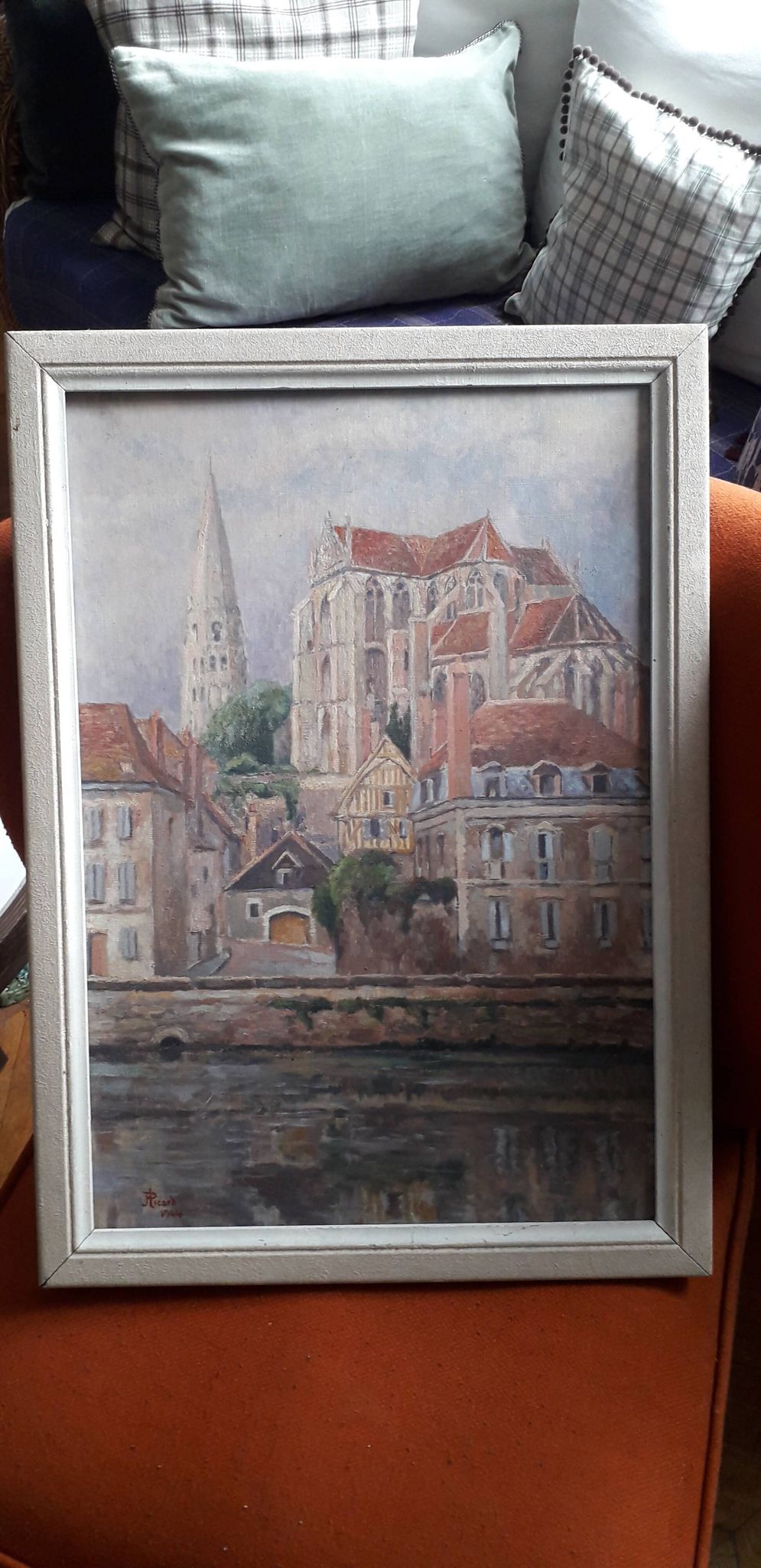 Old oil painting depicting a landscape