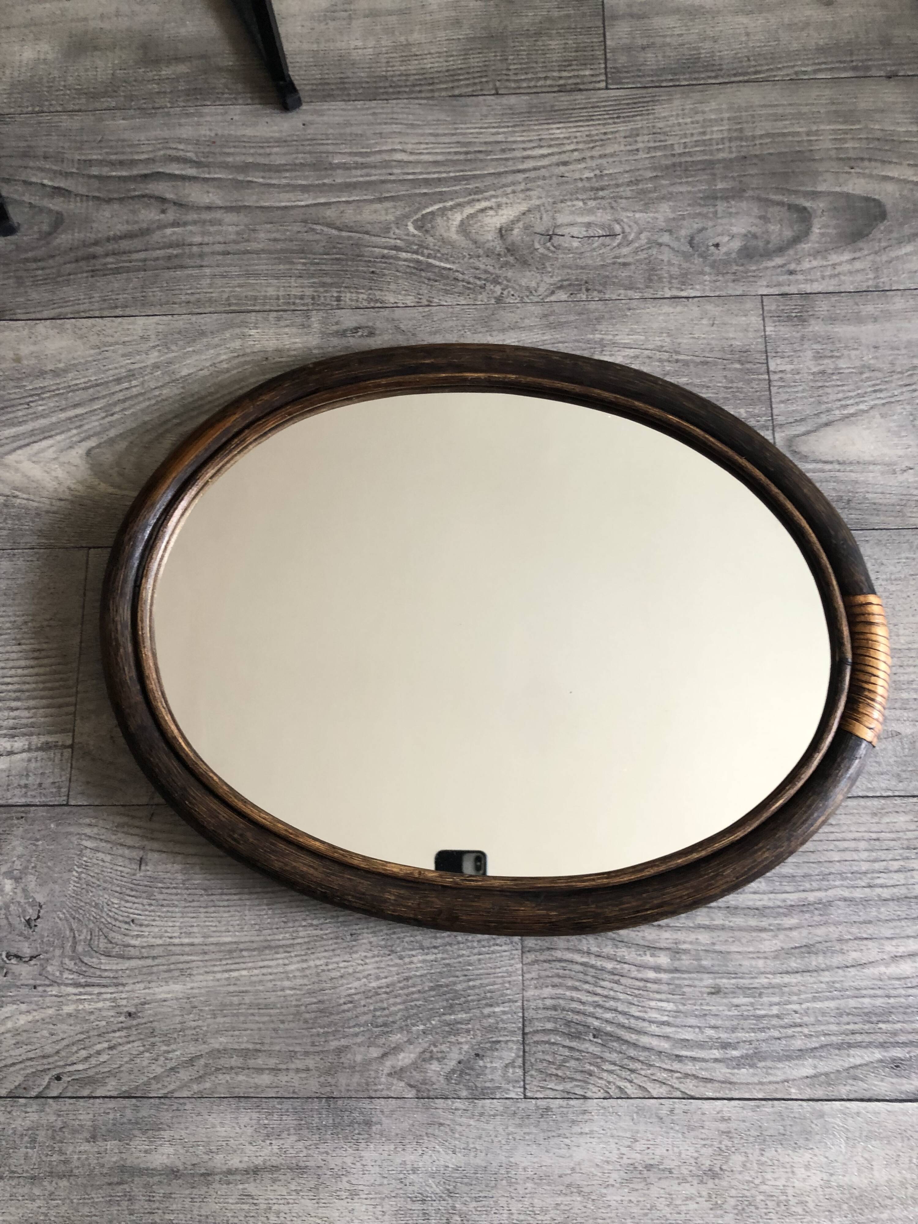 Oval rattan mirror