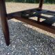 Table en palissandre Topform. Table basse vintage. Sangles en cuir