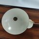 Brass and metal-laying lamp