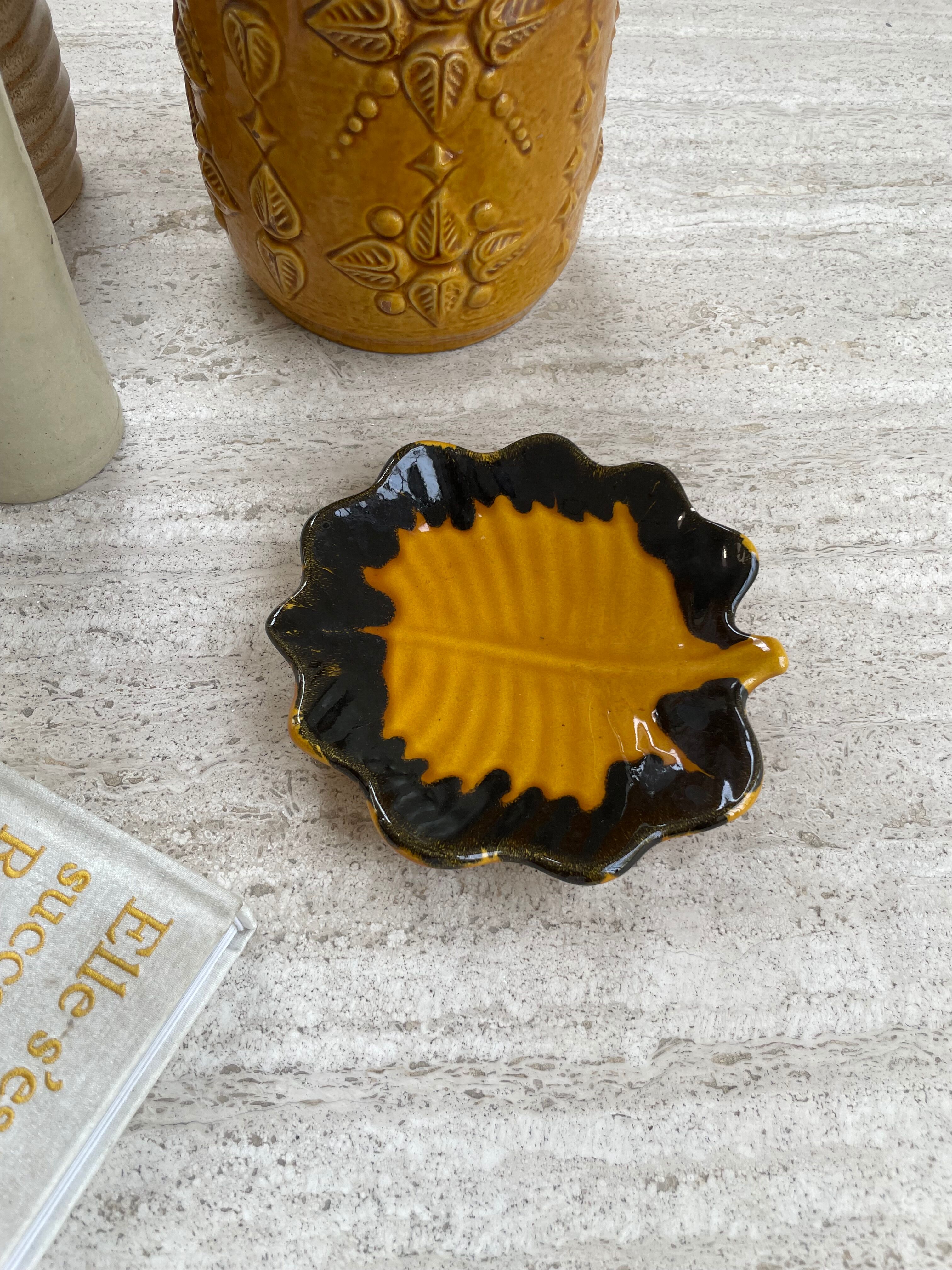 Yellow and black leaf dish
