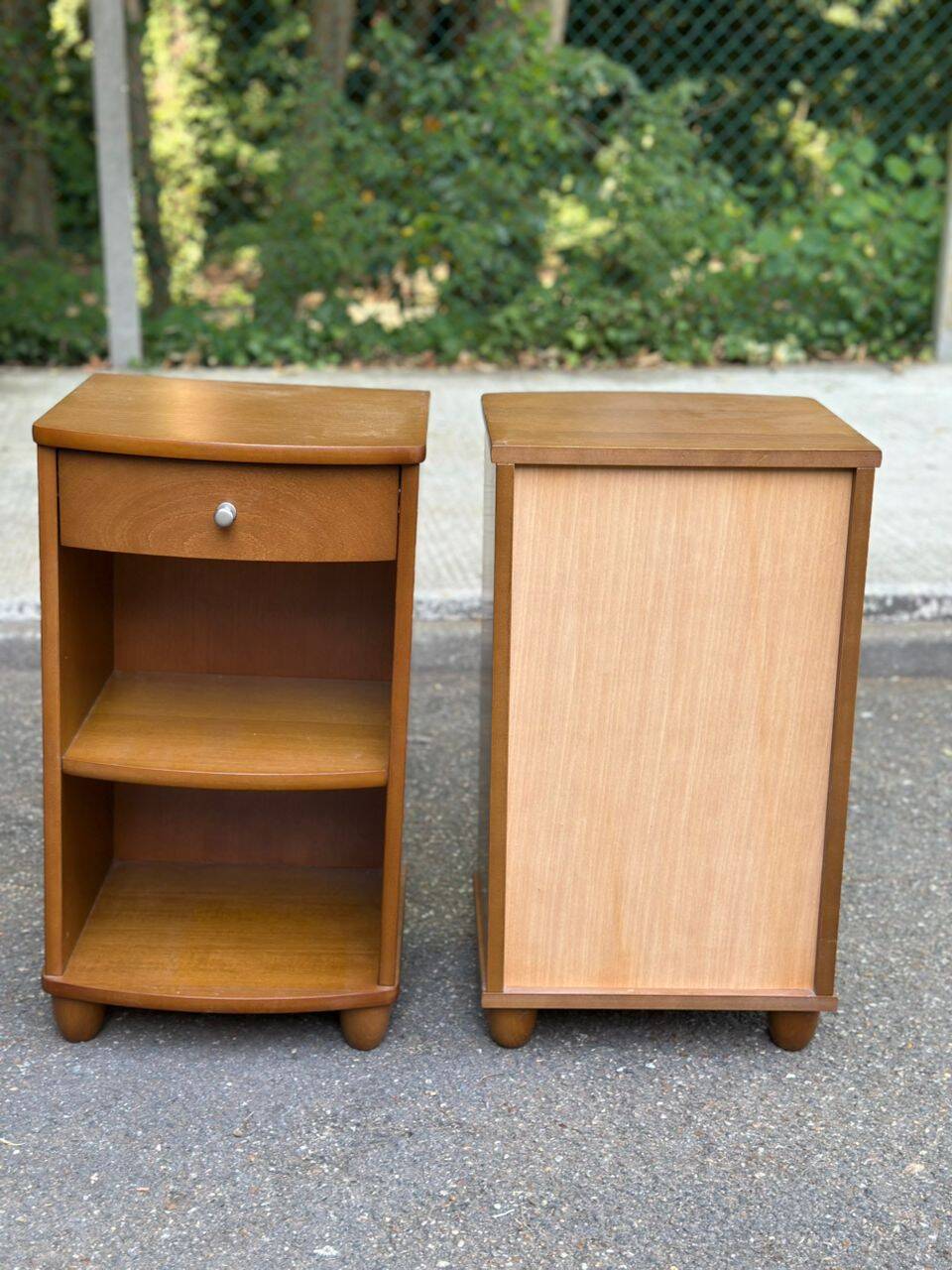 2 contemporary wooden bedside tables from the 2000s.