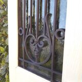 Porte d’entrée ancienne en chêne vitrée grilles en fonte 1925
