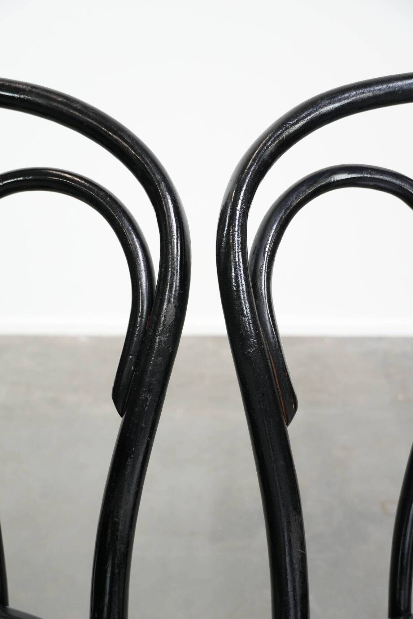 Set of 2 black vintage bistro chairs with an elegant design