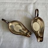 Set of two silver metal saucepans