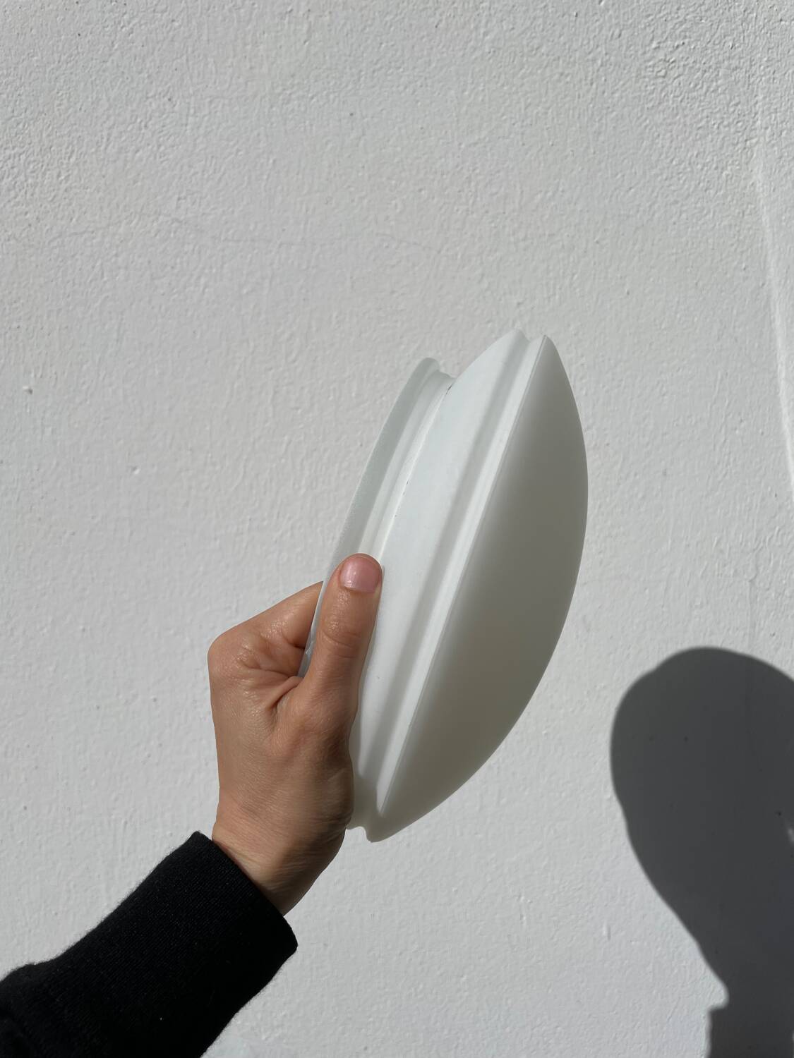 White glass and stainless steel ceiling light