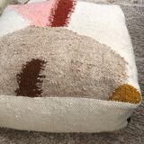 Woven wool pouf