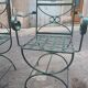 Deux fauteuils et deux chaises de jardin en fer forgé 20 eme