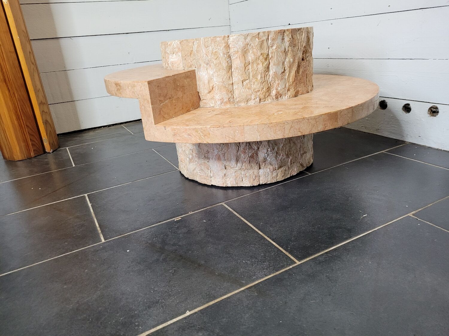Round stone coffee table by Magnussen Ponte