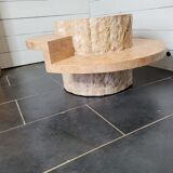 Round stone coffee table by Magnussen Ponte