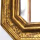 Miroir mural octogonal italien vintage en bois doré, décor bulliné