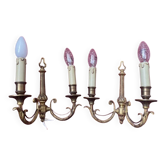 two brass wall sconces