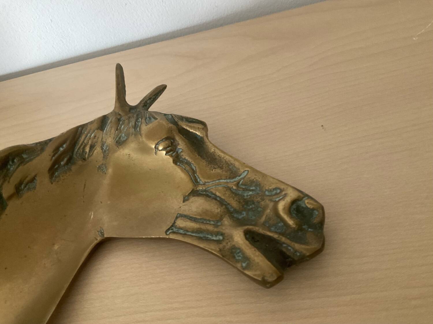 Vintage bronze horse pocket emptier