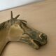 Vintage bronze horse pocket emptier