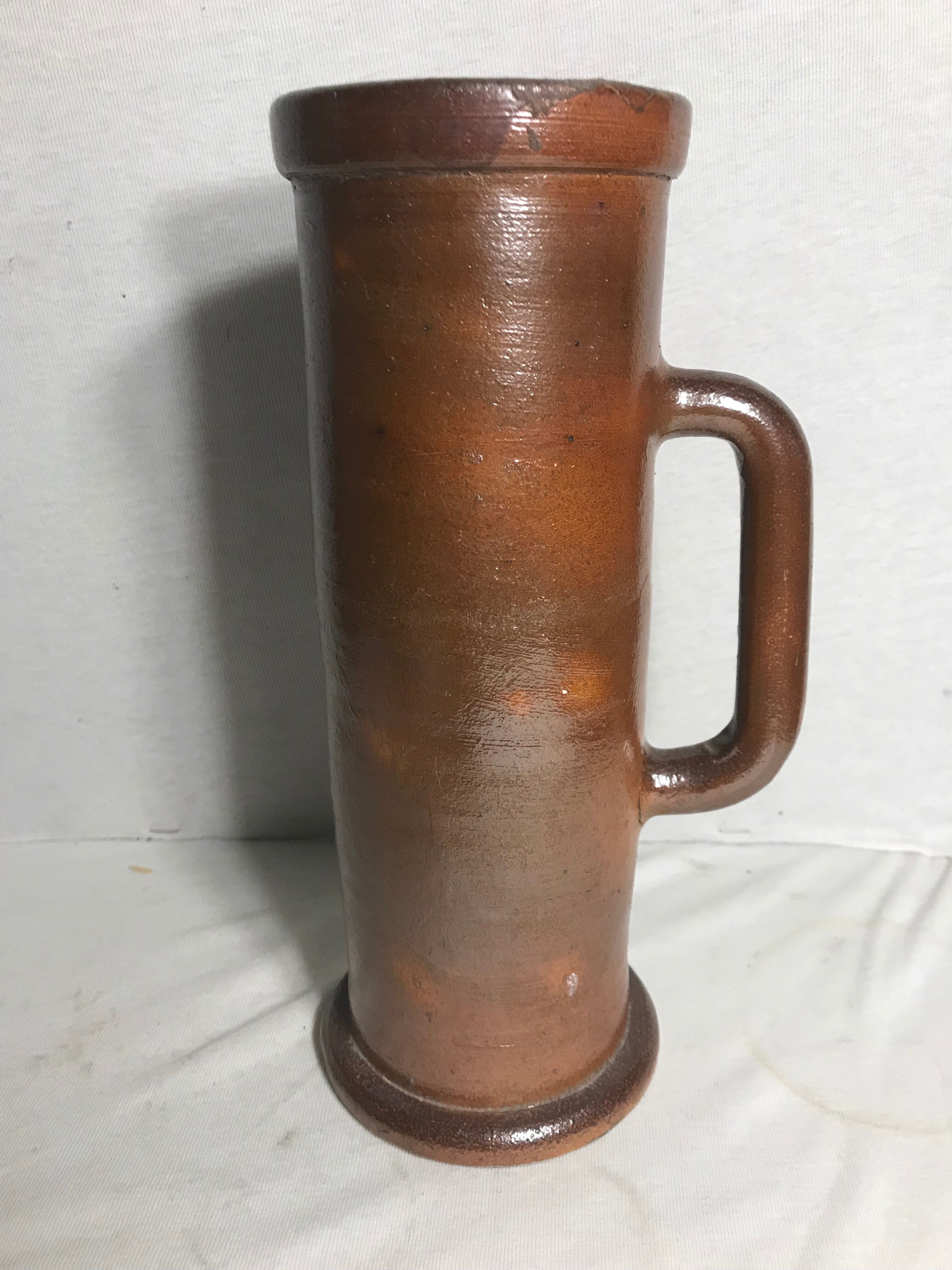 Old pitcher top in brown sandstone 70s