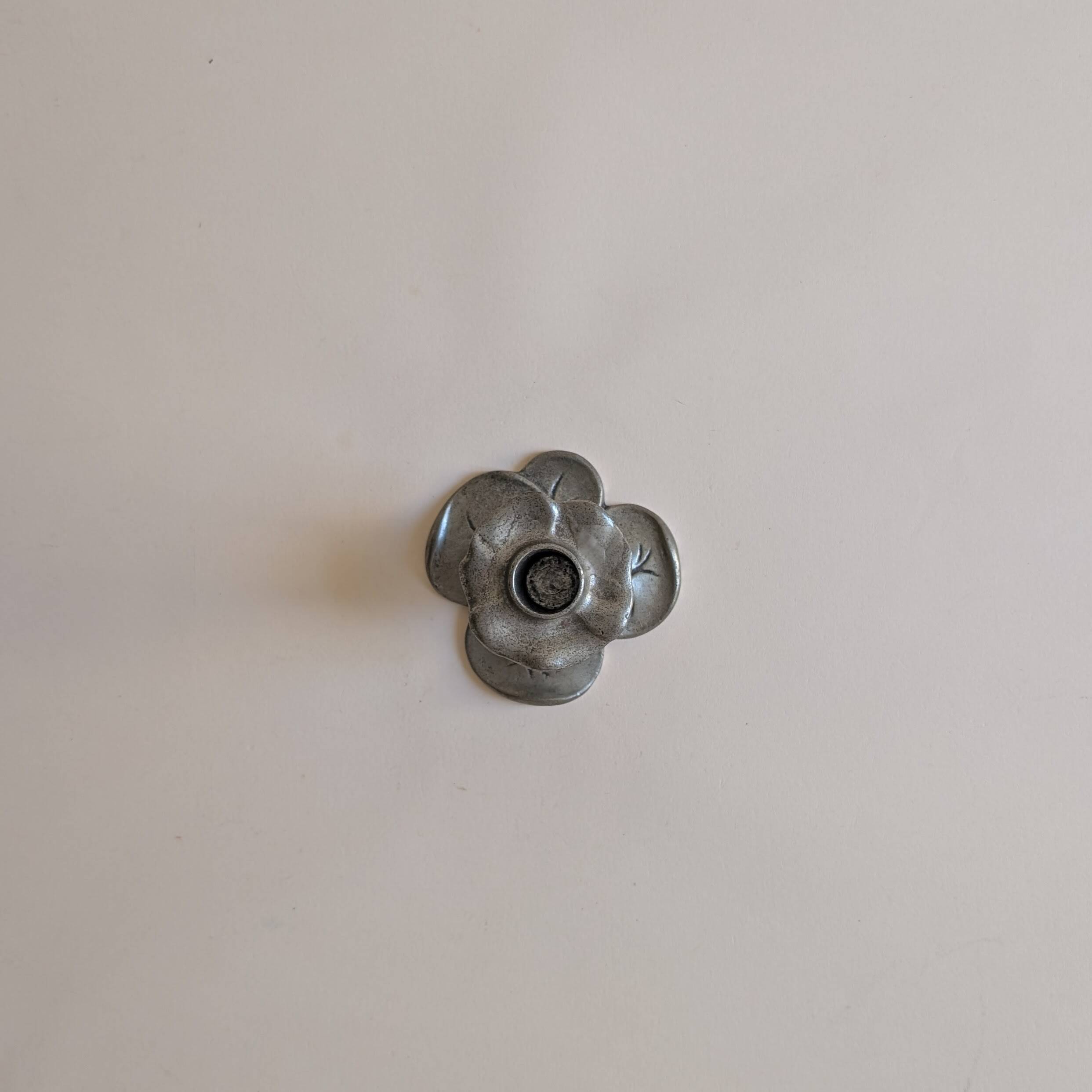 Tin candle holder