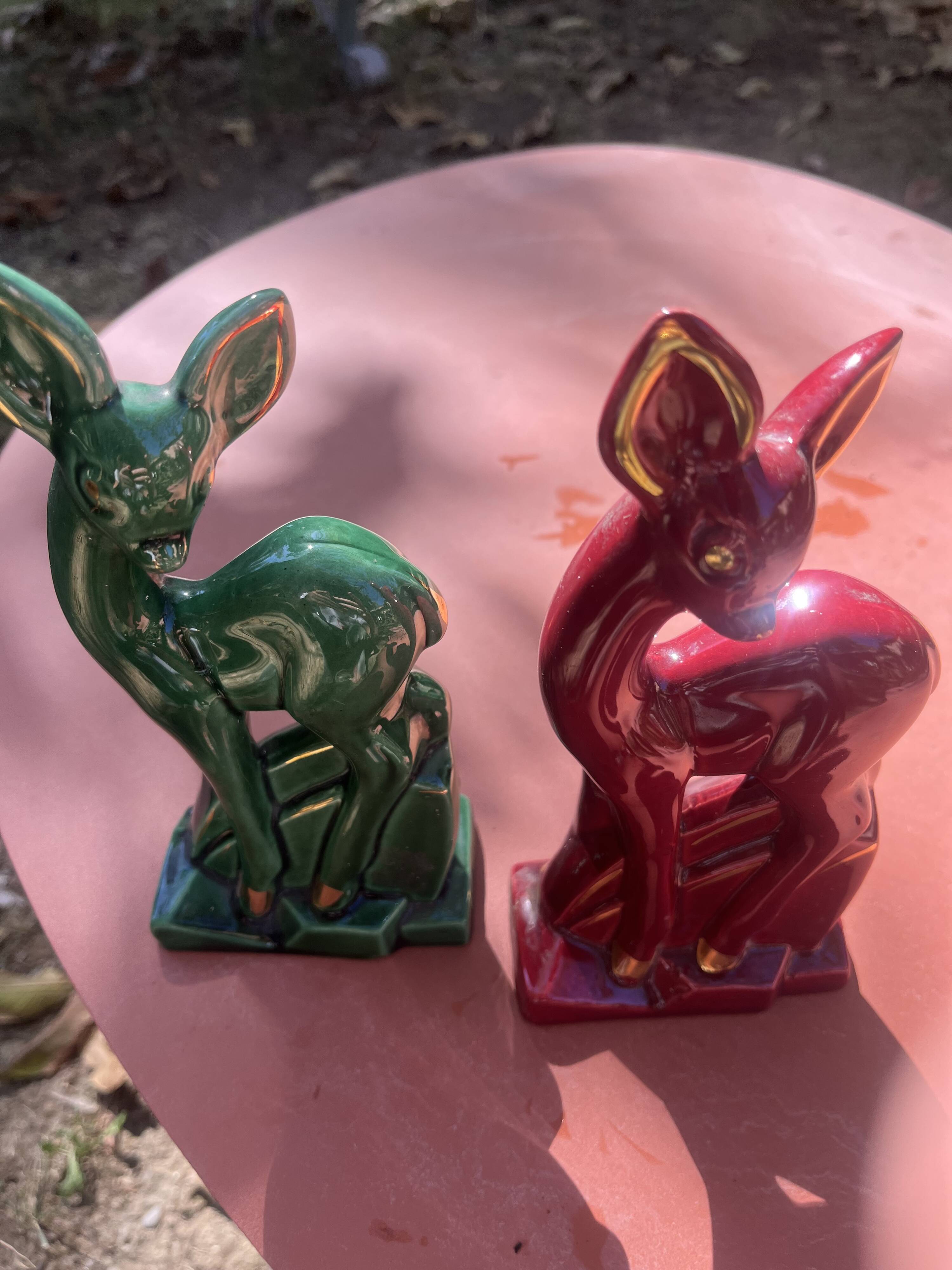 Pair of Art Deco deer by Charles Lemanceau in red and green ceramic.