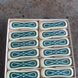 Set of 12 knife holders in green and beige glazed ceramic, slip,