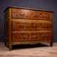 Louis XV transitional commode in precious wood marquetry.
