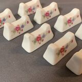 Porte couteaux x12 en porcelaine