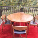 Roundtable with extension cords and chairs from the 1960s