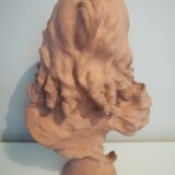 Girl bust signed Bastet in terracotta