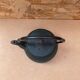 Old green cast iron Japanese teapot with flower decoration + vintage stand