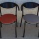 4 gondola-style chairs with a sturdy metal frame and faux leather.