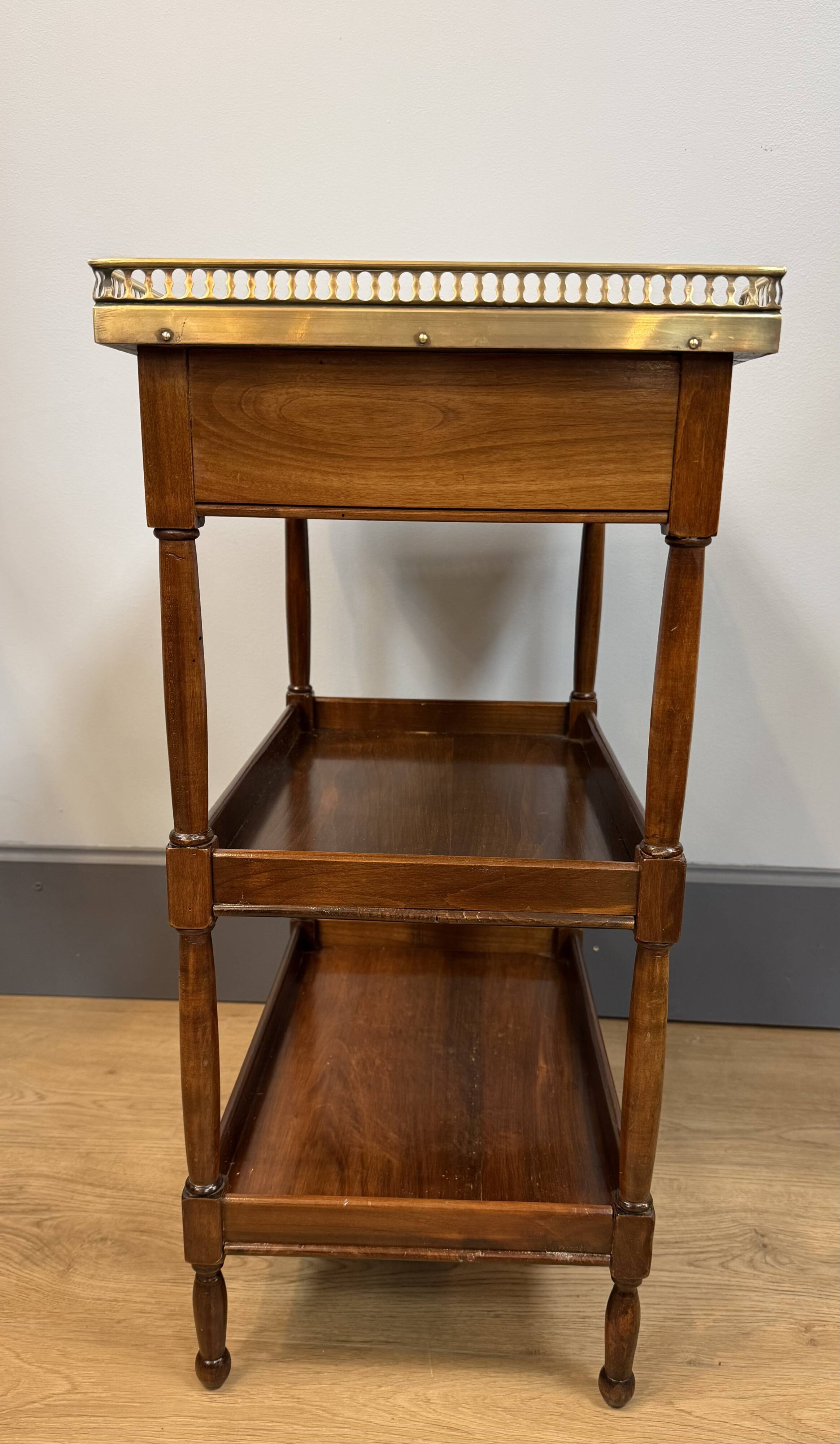 Small mahogany side table in Louis XVI style.
