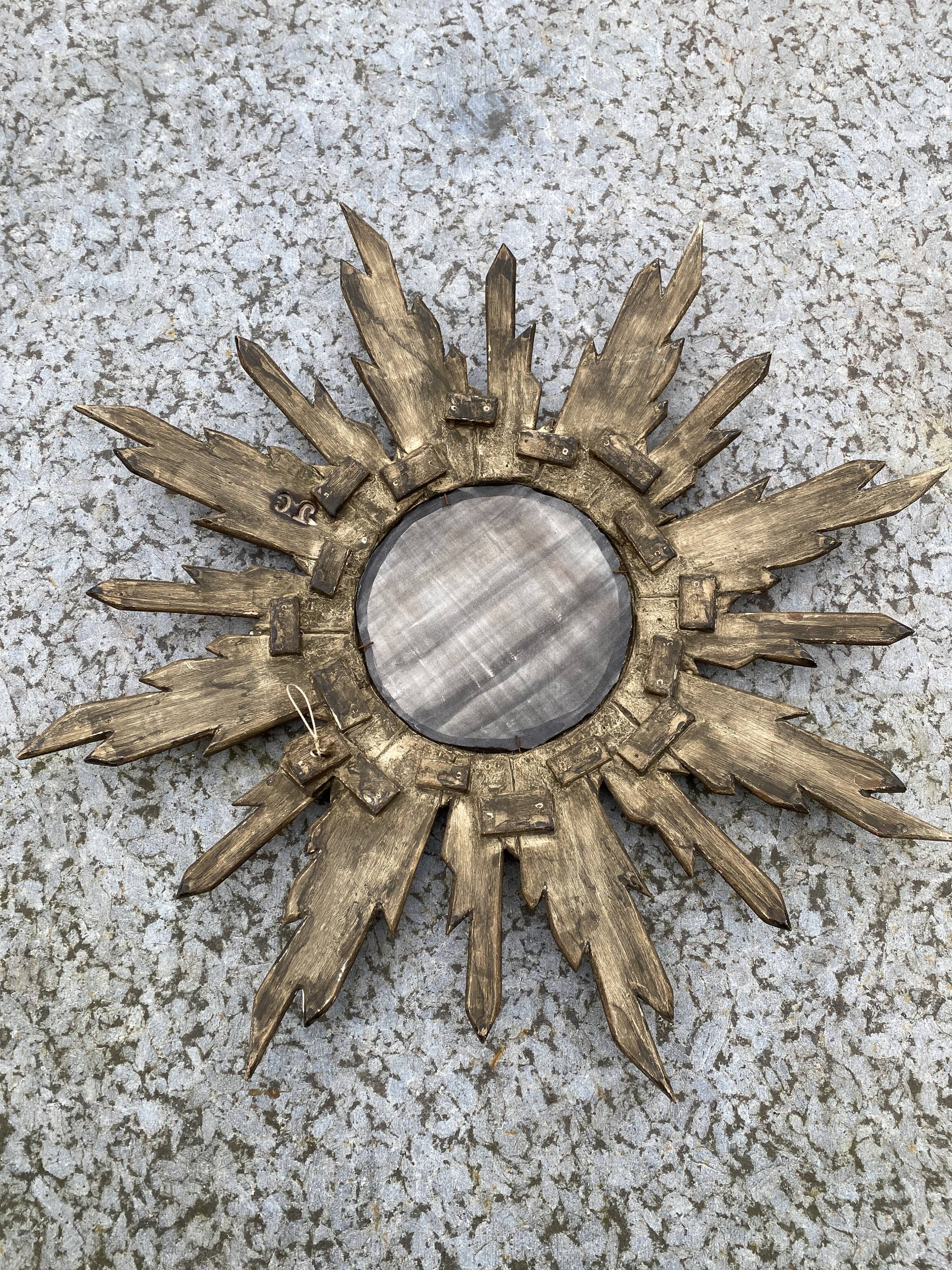 Genuine antique sun mirror