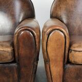 Set of two sheepskin Art Deco design armchairs with beautiful patina