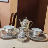 Breakfast set with tea or coffee in porcelain.