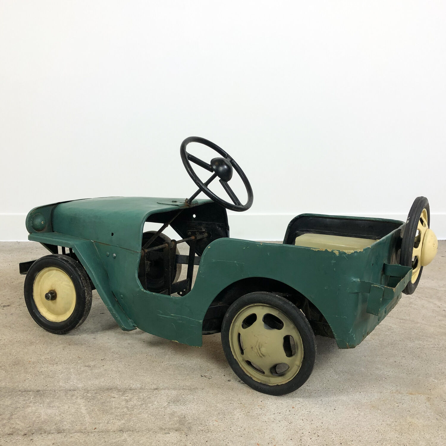 Vintage Willys Jeep pedal car by Tri-Ang