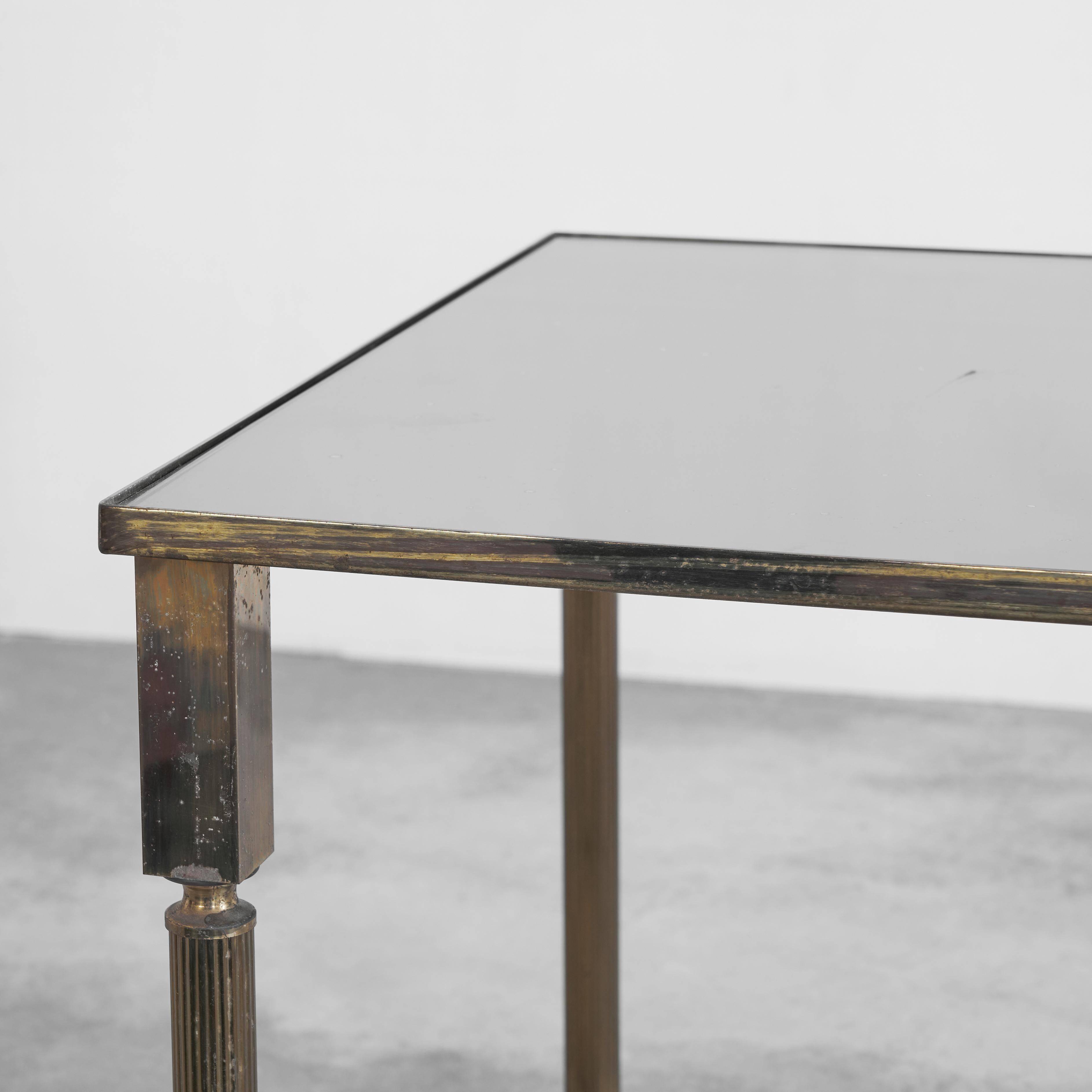 Table basse en laiton patiné et verre Maison Charles années 1960