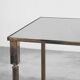 Table basse en laiton patiné et verre Maison Charles années 1960
