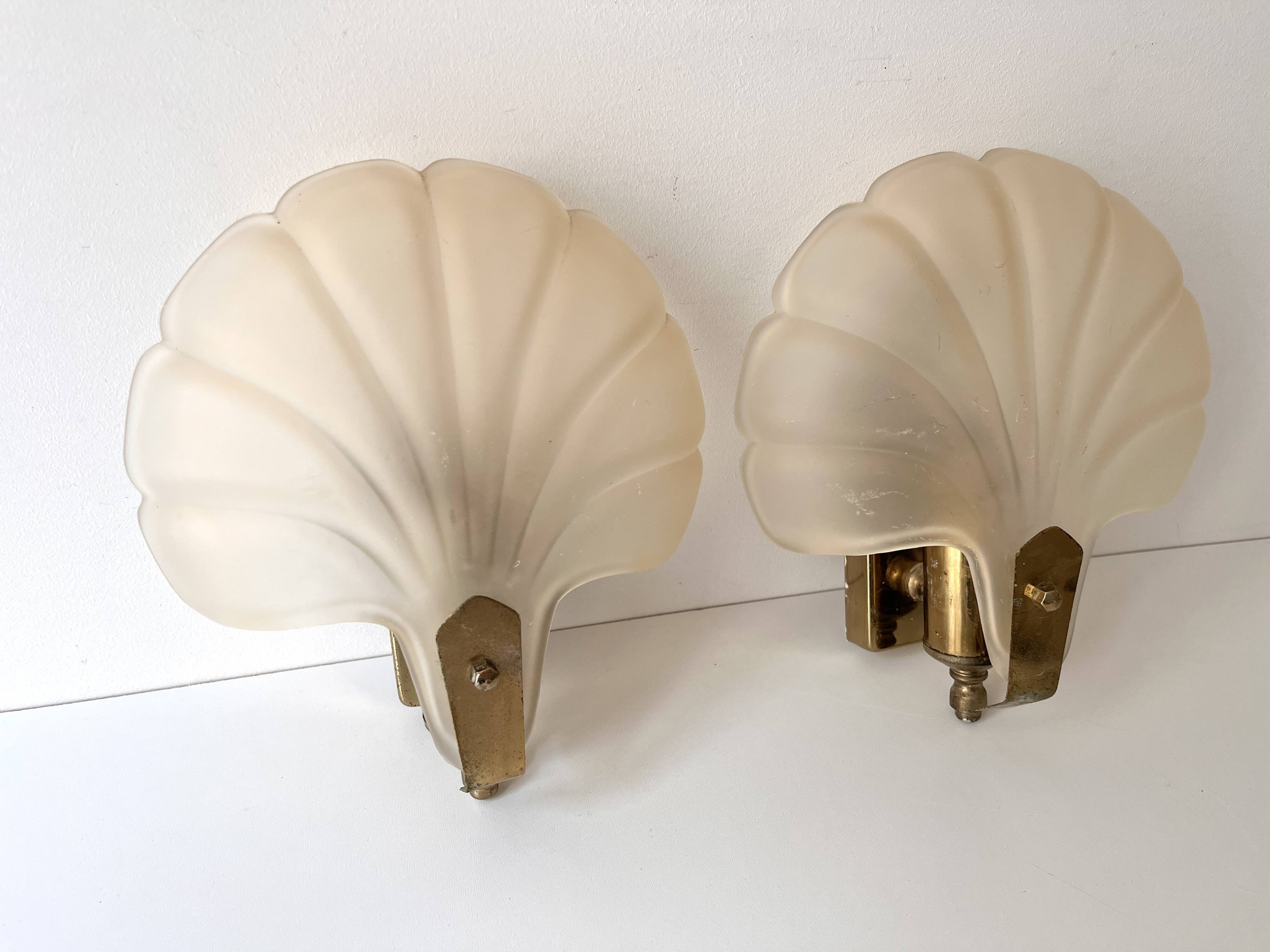 Pair of vintage shell glass wall lights, Art Deco style fixtures.