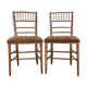Paire de chaises dorées «faux bambou»