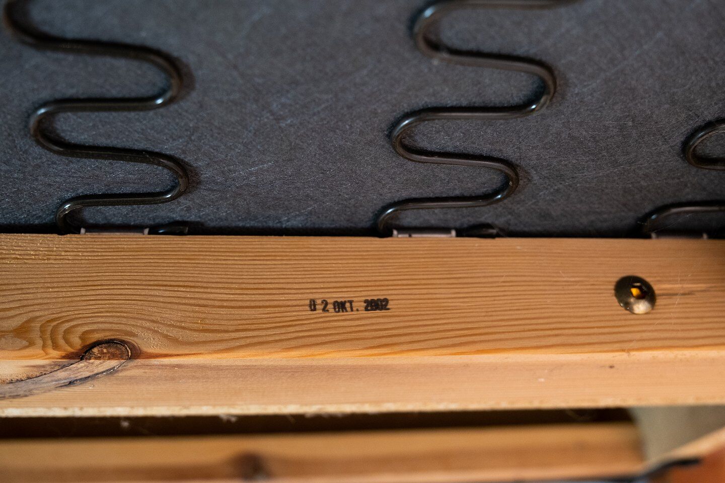 Two seater sofa upholstered with black leather and of danish design
