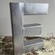 Metal sign letter E
