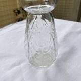 Small glass vase with leaf pattern.